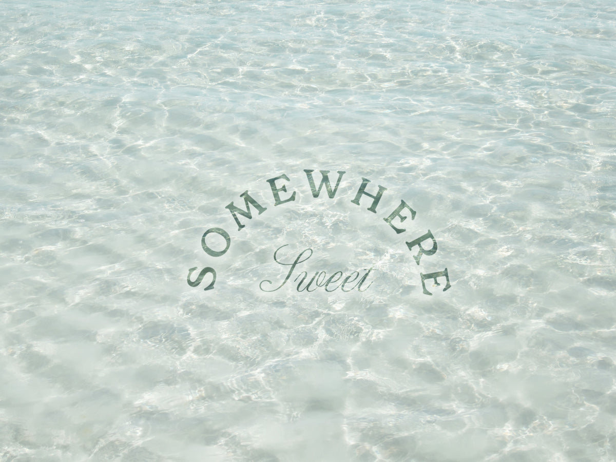 Clear water ocean, with brand logo on top